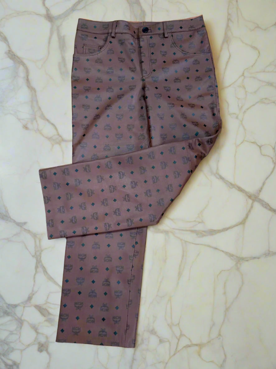 Brown patterned pants on a marble floor